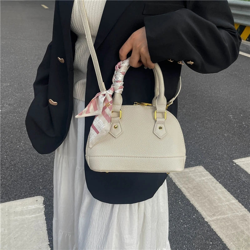 2025 High-End Handbag for Women - New Niche Versatile Hand-Held Shell Bag for Commuting with Fashionable Temperament